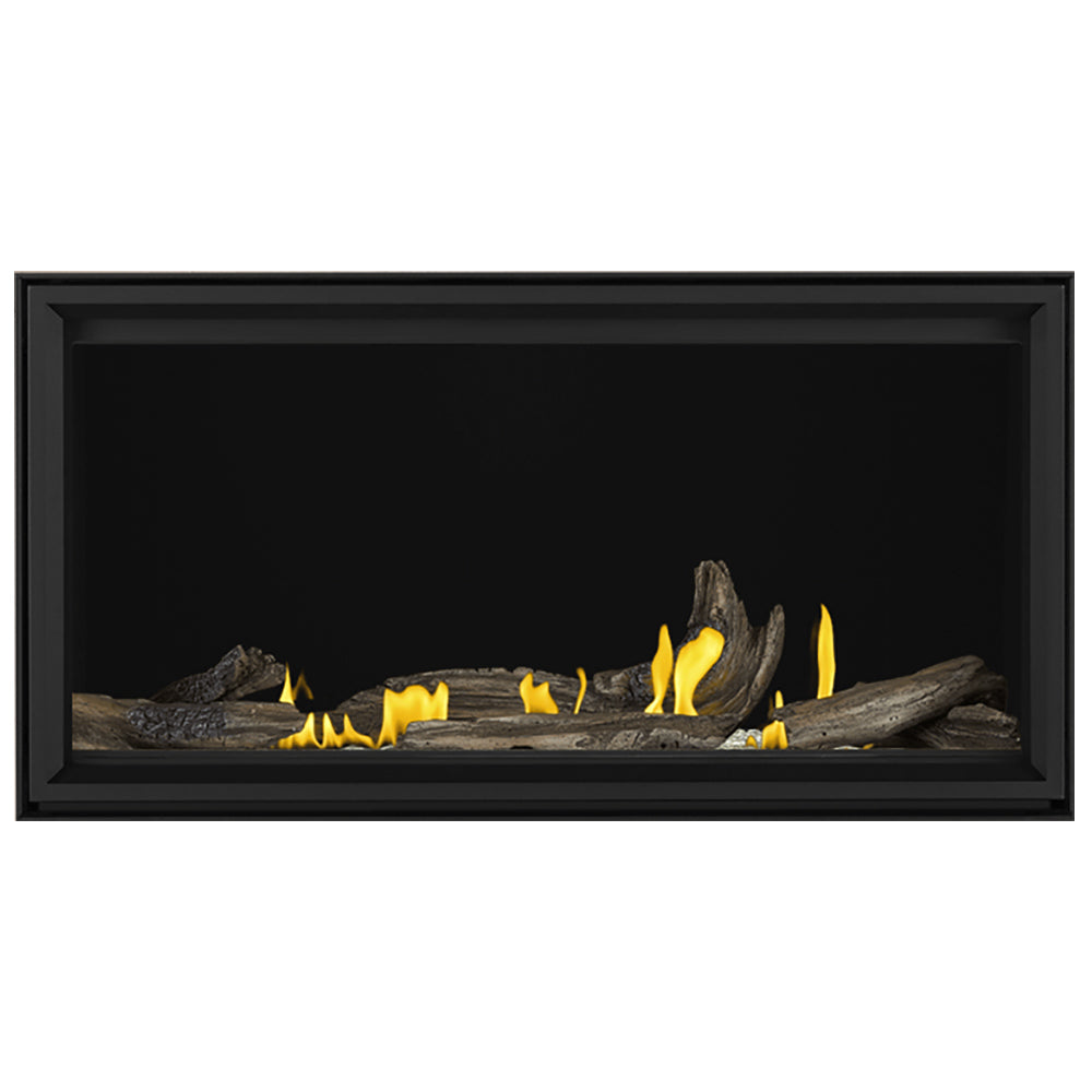 Linear direct vent gas fireplace with dark logs and yellow flame embers