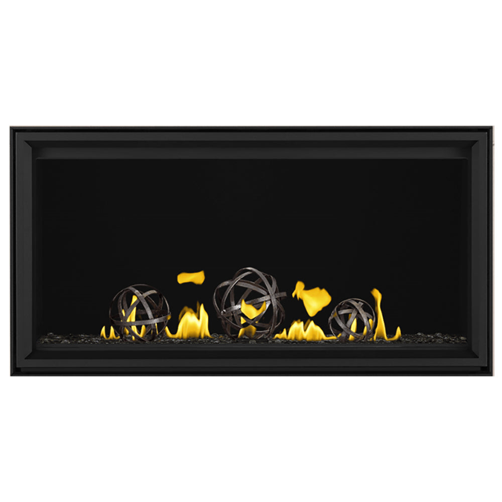 Linear gas fireplace with black frame, iron globe accents, yellow flames and blue embers