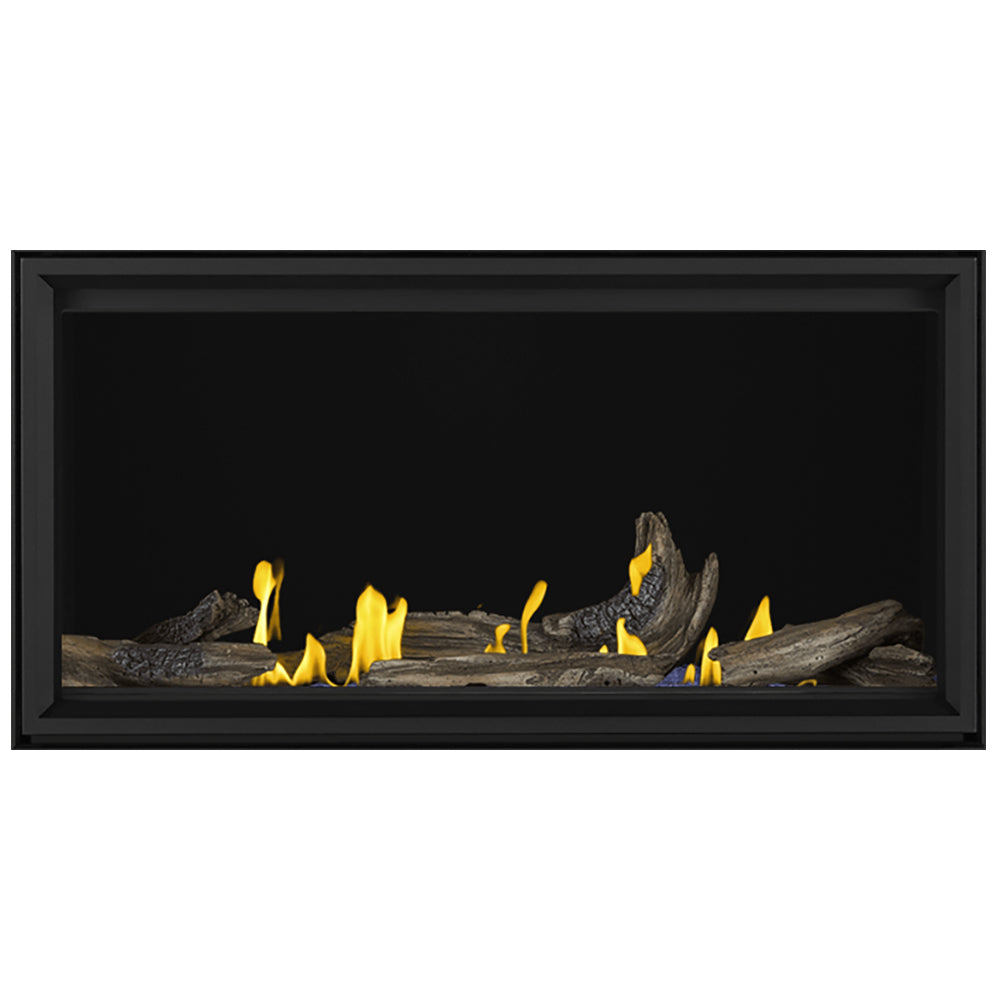 Linear direct vent gas fireplace with burning dark logs in black frame