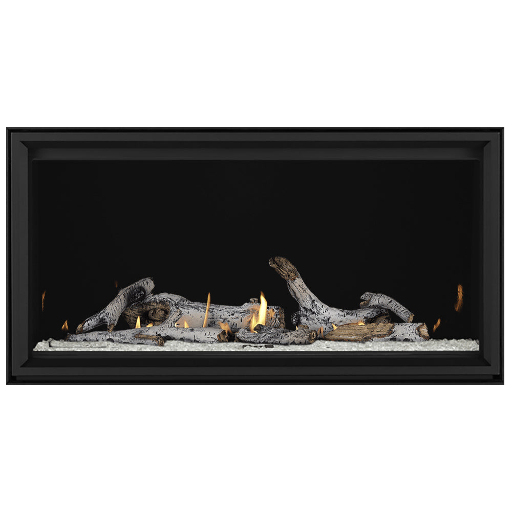 Linear direct vent gas fireplace with burning logs over gray ember bed in black frame