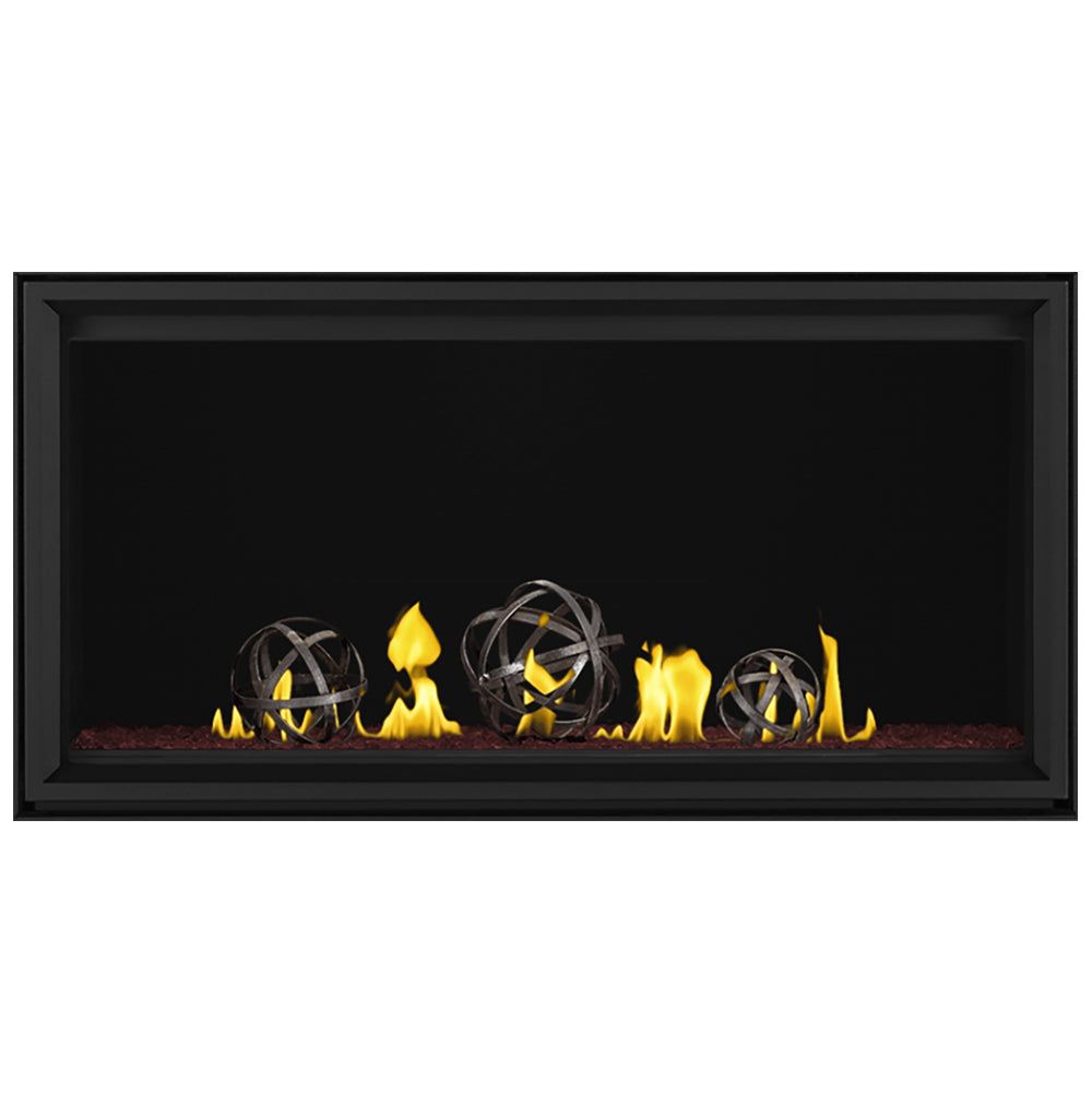 Linear direct vent gas fireplace with dark frame, wrought iron globes and yellow flames