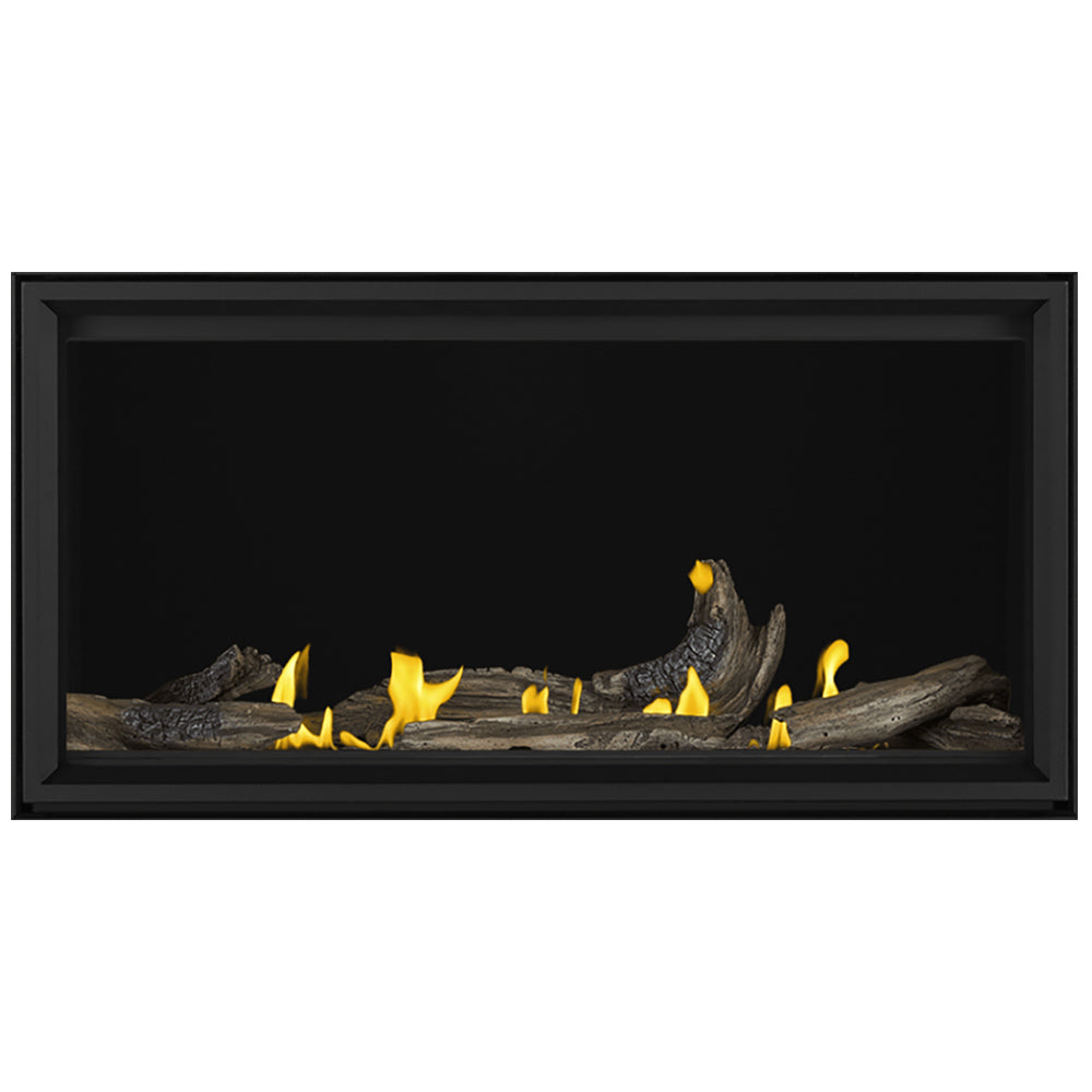 Linear direct vent gas fireplace with burning dark logs in black frame