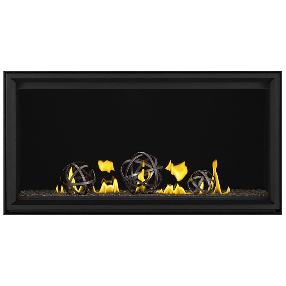 Linear direct vent gas fireplace with dark frame, wrought iron globes and yellow flames