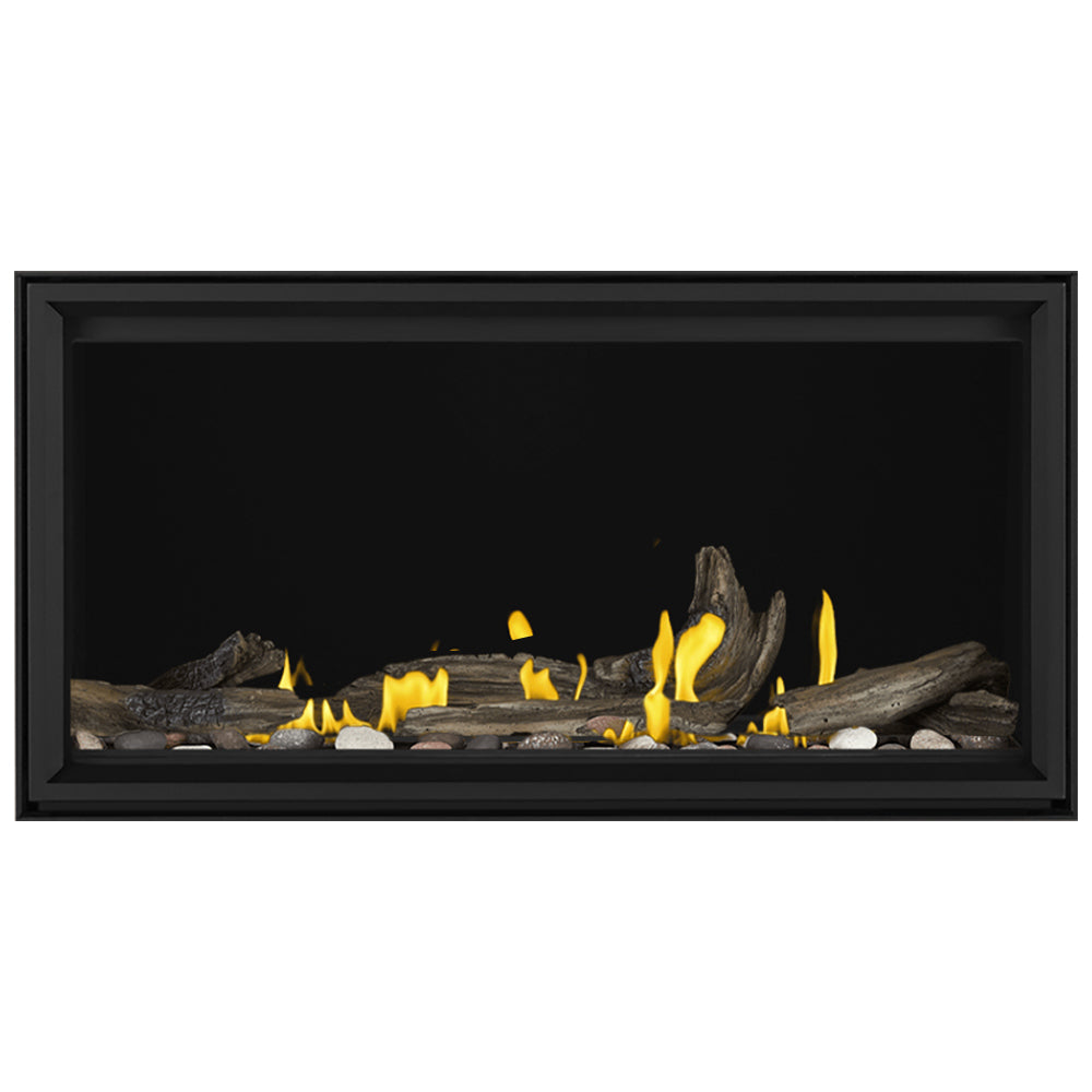 Linear direct vent gas fireplace with dark logs and scattered ember-bed flames