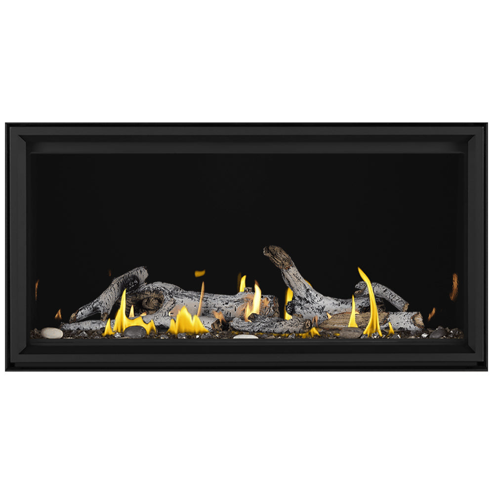 Linear gas fireplace with glowing flames over grey log set, black glass-front frame