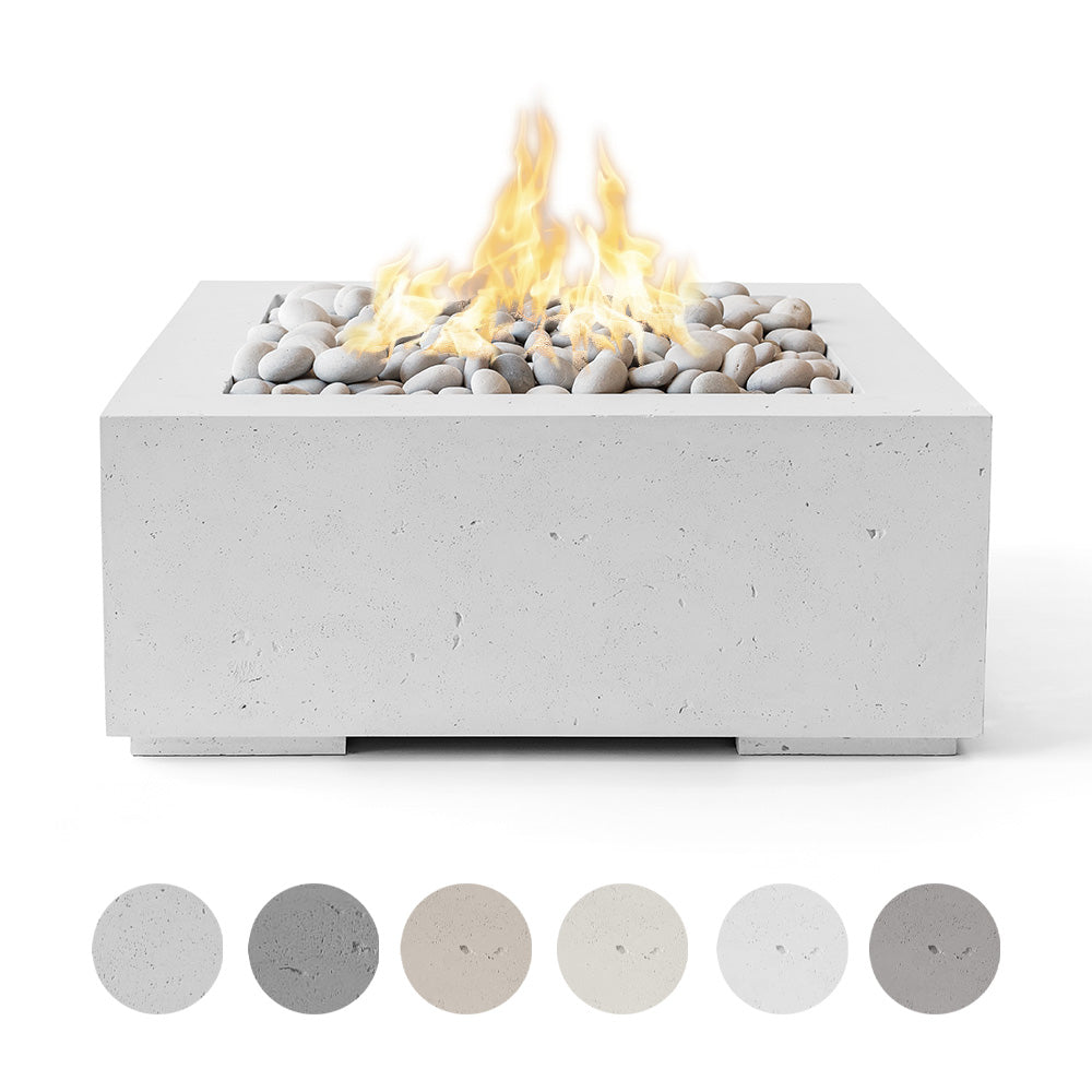 Lightweight concrete square gas fire pit with white stone media and visible flames