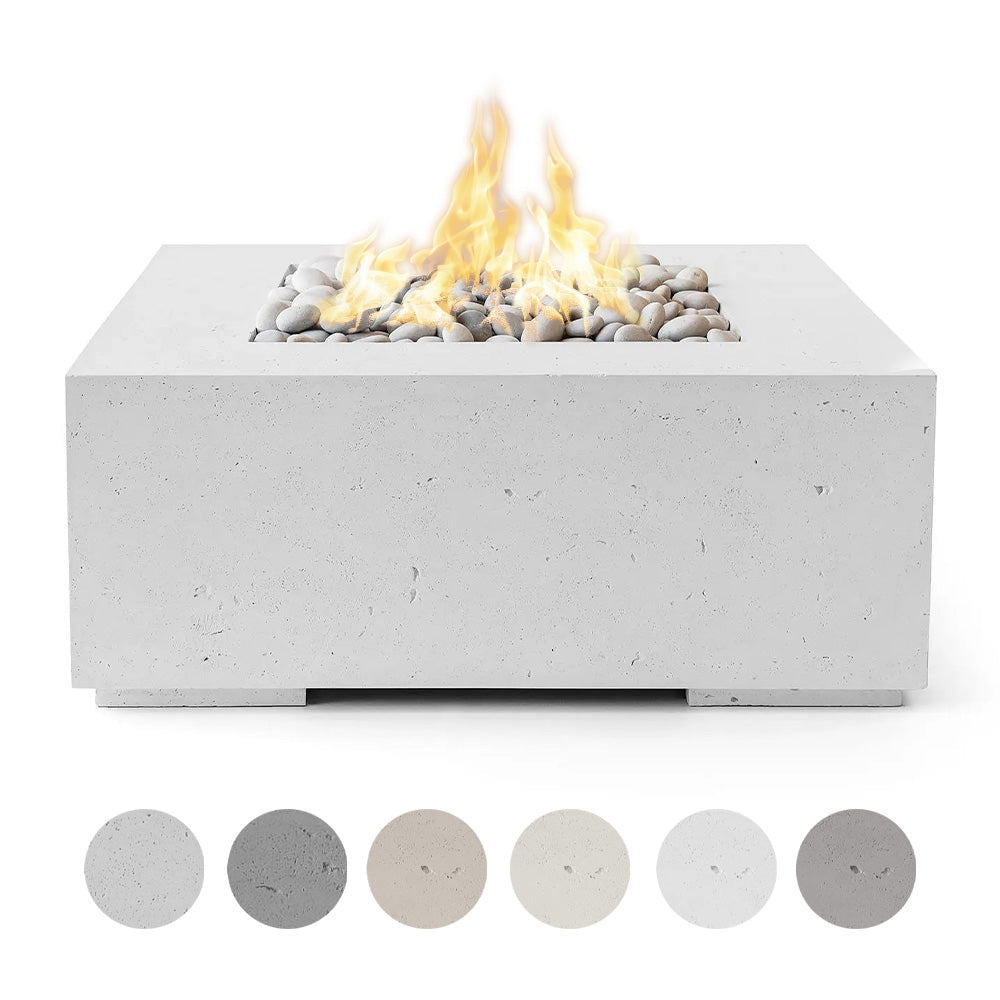 Square concrete gas fire pit with flames and gray river stones