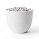 Concrete gas fire bowl with light-colored pebble media