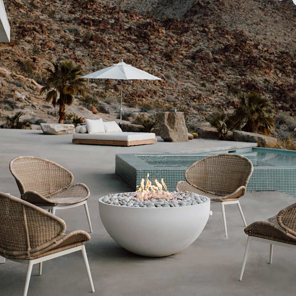 40-inch lightweight concrete gas fire bowl with flames and light gray pebble stones