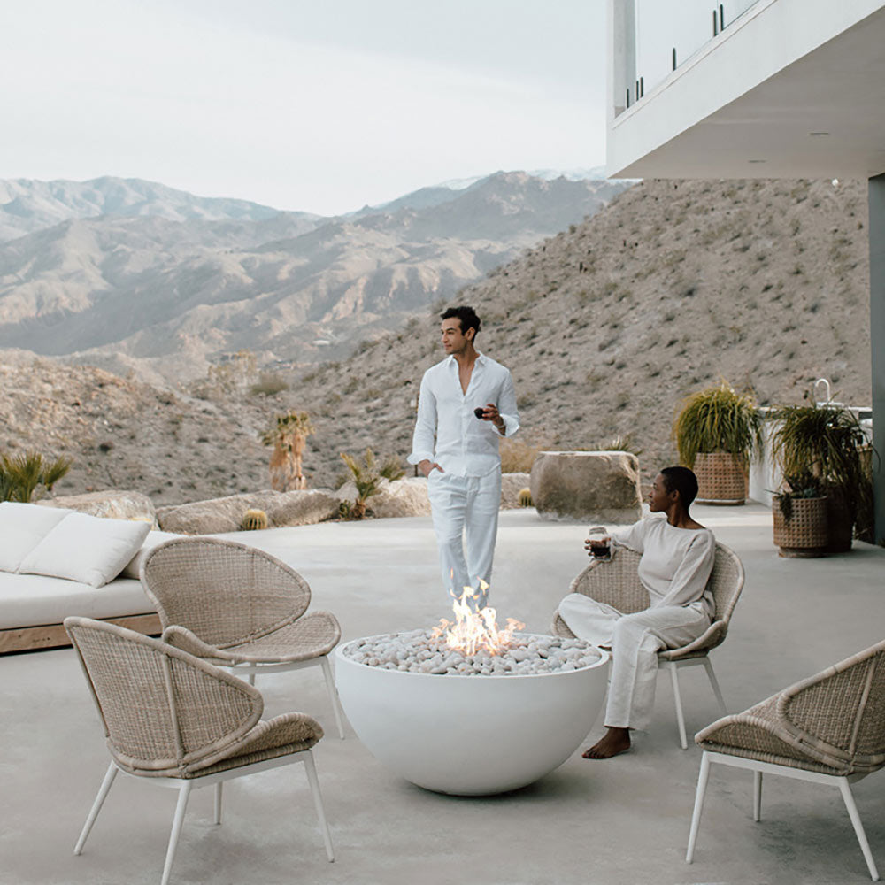 40-inch lightweight concrete gas fire bowl with flames in light gray pebble stones