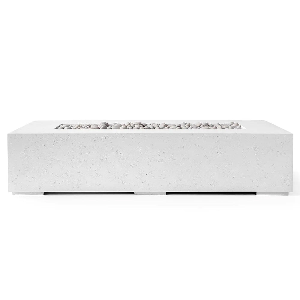 White lightweight concrete gas fire pit with a shallow interior and fire stones on top.