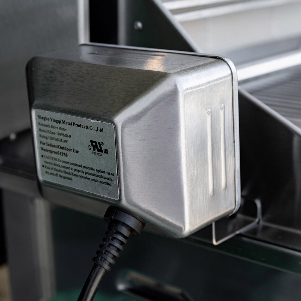 Stainless grill power module with safety label and attached black power cable
