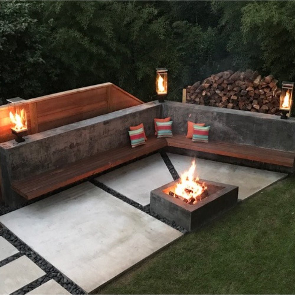 Outdoor corner gas torch with flame burner in glass enclosure