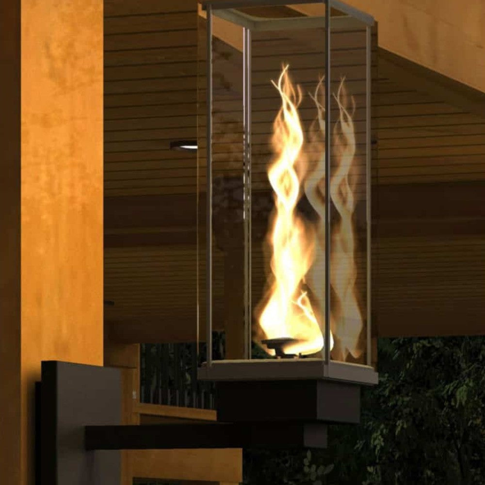 Tall outdoor gas torch with clear glass enclosure and multiple flames