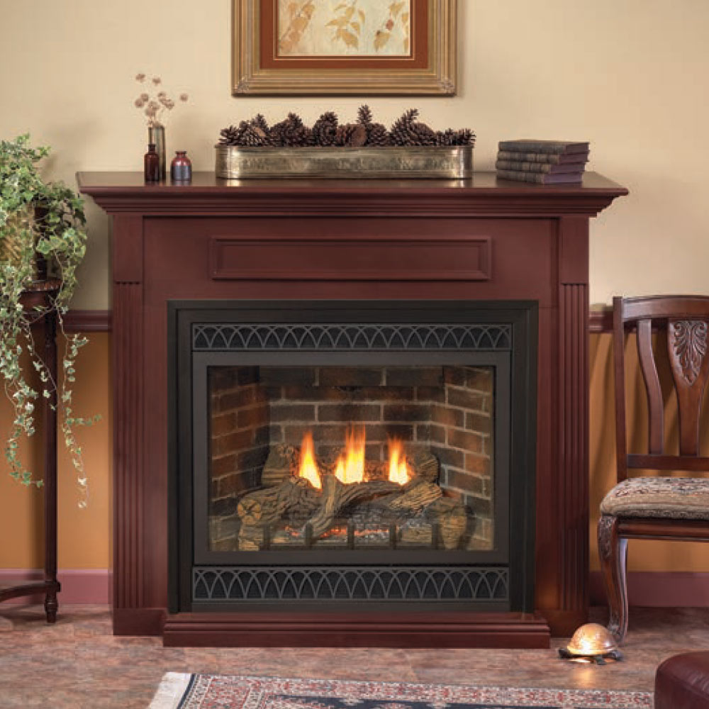 Direct vent fireplace with dark screen and brick-style firebox, flames visible