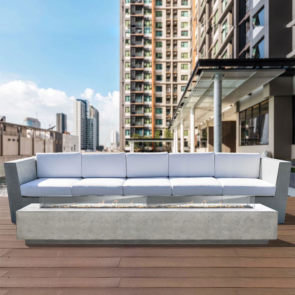 Rectangular concrete gas fire pit with wide burner opening and side-panel details
