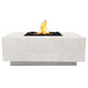Concrete gas fire pit with square top and visible flame, light gray finish