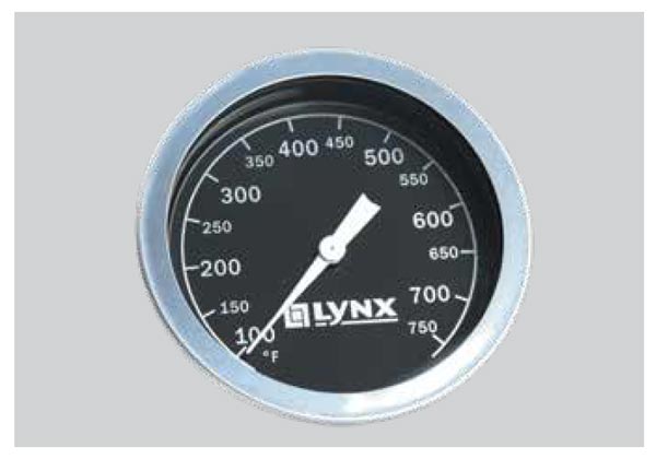 Gas grill temperature gauge with Lynx logo and Fahrenheit markings