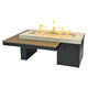 Linear gas fire pit table with black base and light gray tabletop, flame jets visible
