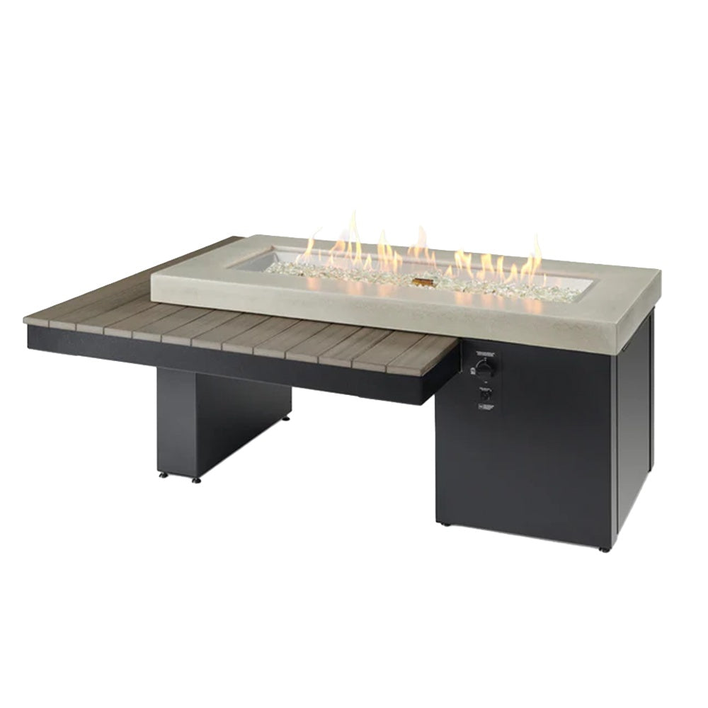 Black linear gas fire pit table with glass burner and glowing flames in rectangular insert
