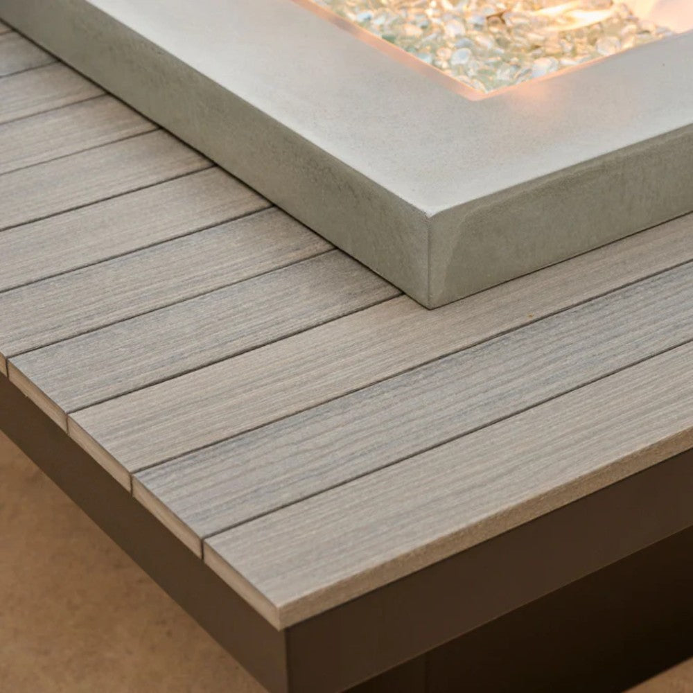Stone-style fire pit table lid with wood slat panel and dark base frame