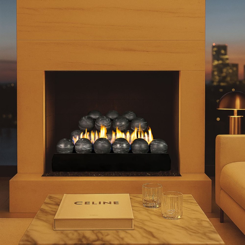 Ventless burner with dark fire spheres and orange flames inside a black fireplace opening