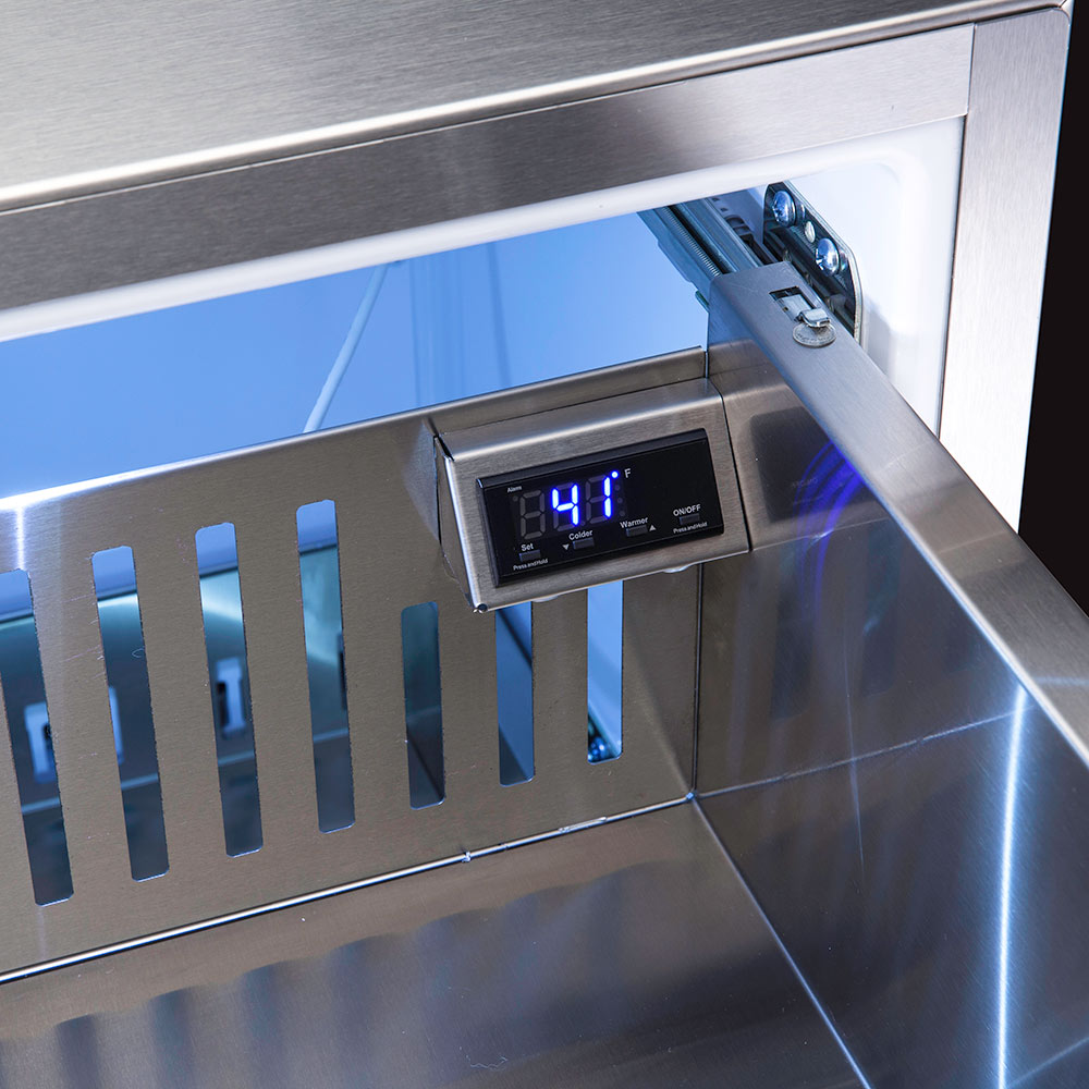 Stainless steel refrigerated drawer with digital control panel and open compartment