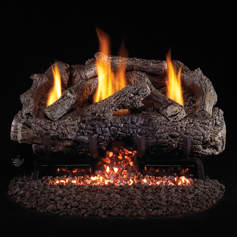 Charred oak gas log set with glowing flames and black metal burner base
