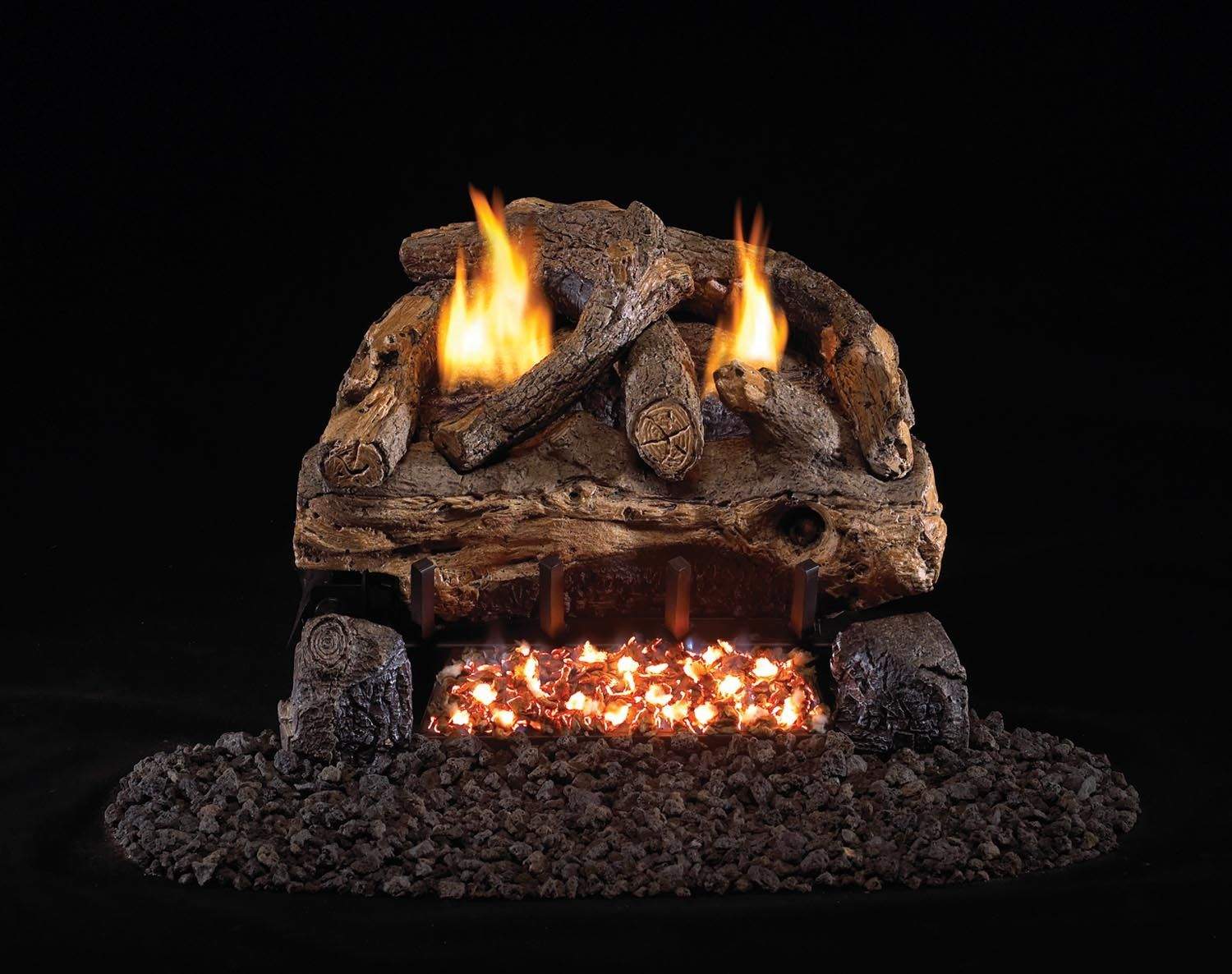 Ventless gas log set with stacked logs, glowing ember bed and multiple flames