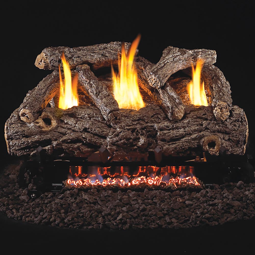 Golden oak ventless gas log set with three burning flames over dark log bed