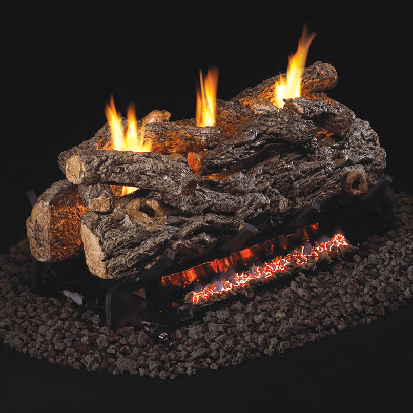 Ventless gas log set with glowing flames and charred wood logs on a black base