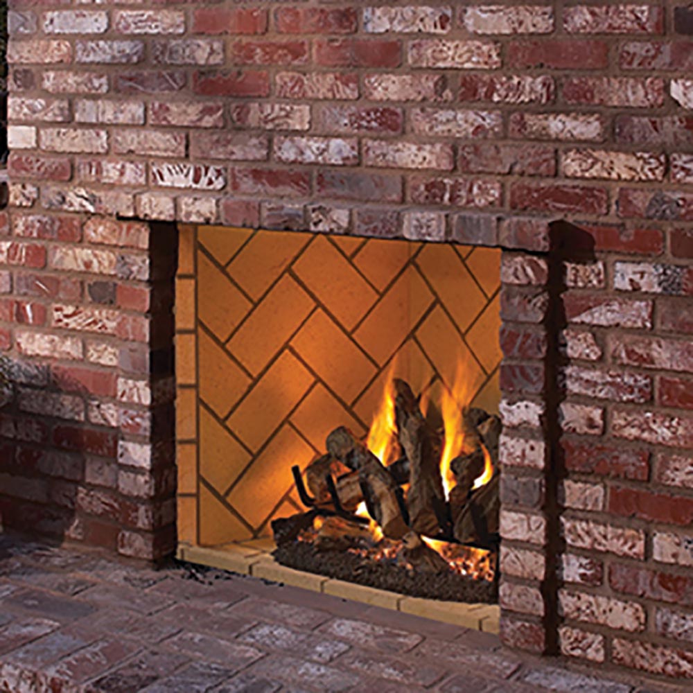 Mosaic masonry brick firebox surround with flames and dark log grate inside