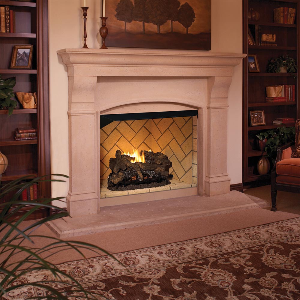Beige mosaic masonry firebox with arched hearth opening and blackened firebrick interior