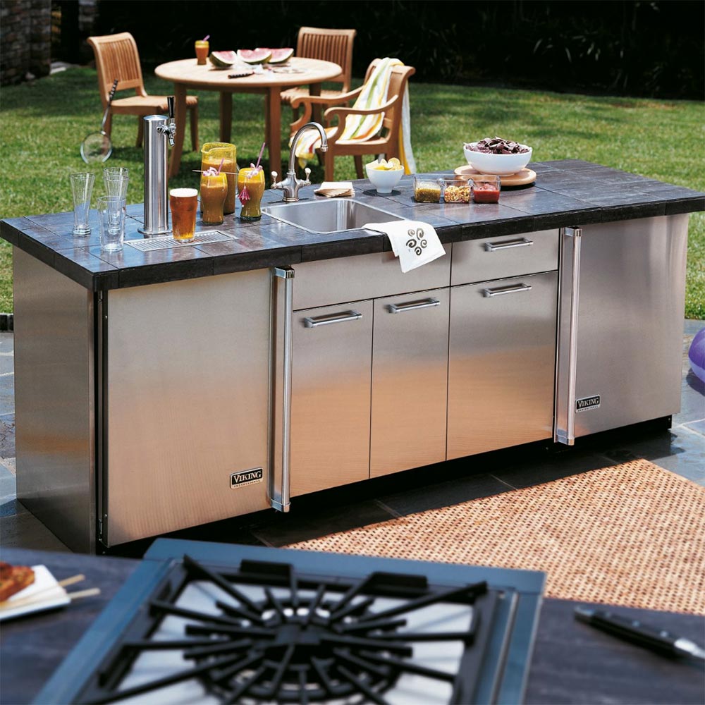 Stainless sink base cabinet with stainless doors, drawers, and outdoor countertop