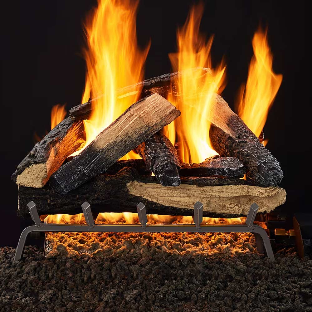 Outdoor gas log set with glowing wood logs on black burner grate and open flames