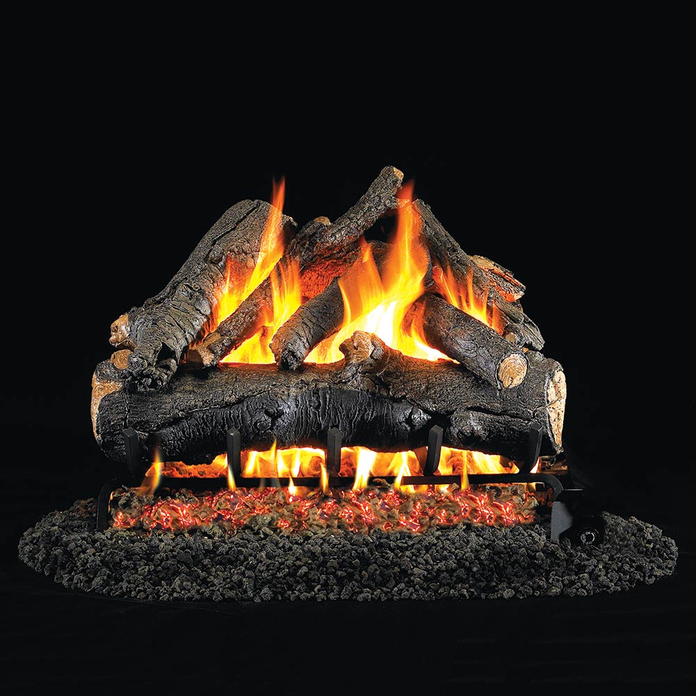 Burning vented gas logs with glowing embers and stacked log pieces