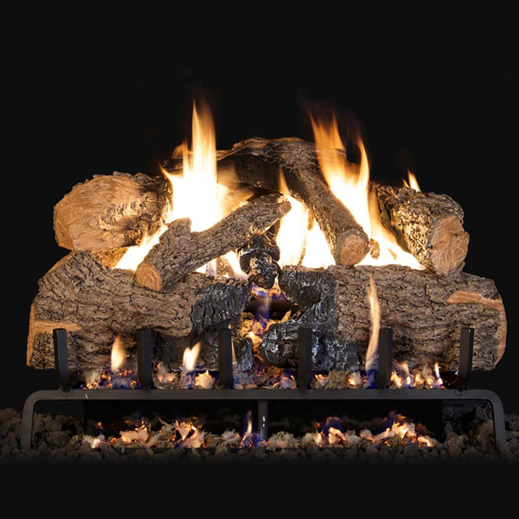 Charred angel oak vented gas log set with glowing flames and black burner grate