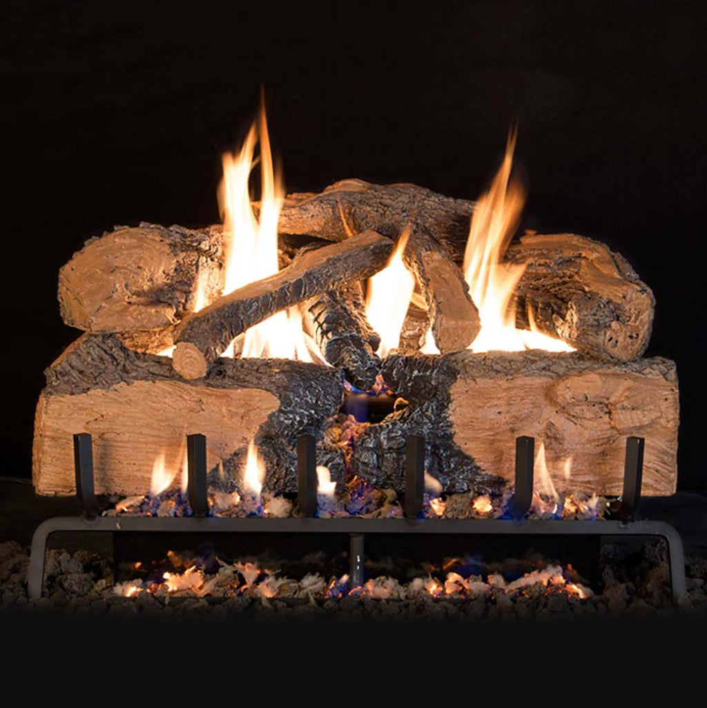 Real Fyre charred oak vented gas logs with steady flames and embers