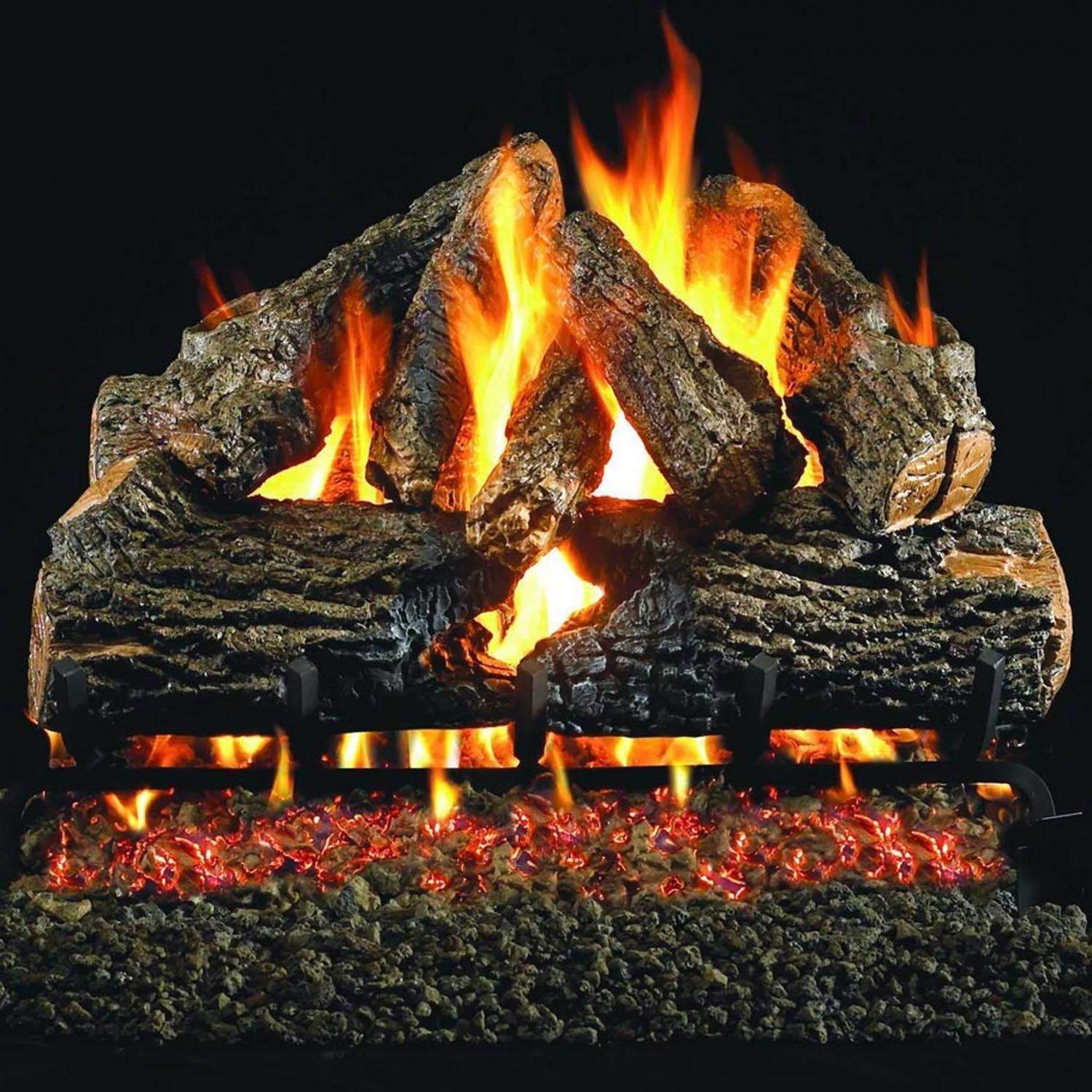 Charred northern vented gas log set with flames and glowing embers across the log bed