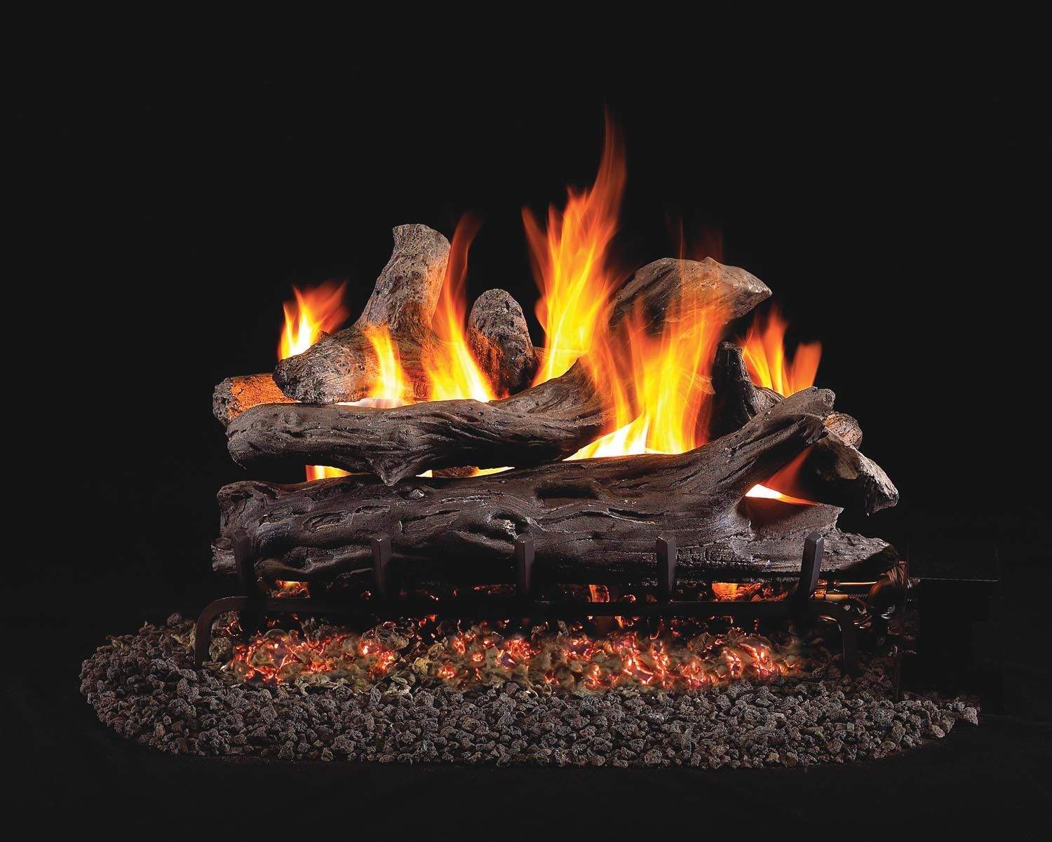 Vented gas log set with driftwood-style logs, flames, and glowing ember bed