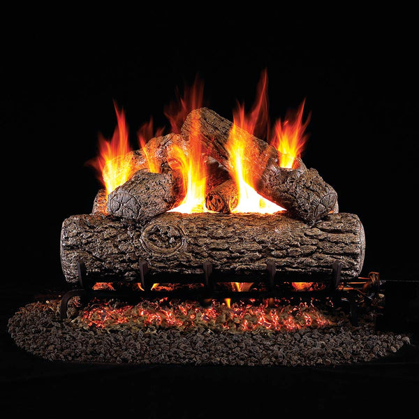 Real Fyre vented gas fire logs with burning flames and charred log texture