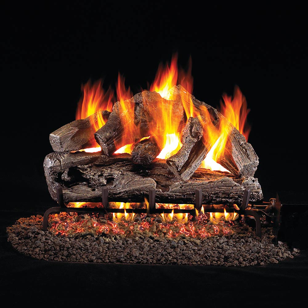 Vented gas log set with stacked charred logs, bright flames, and glowing ember bed
