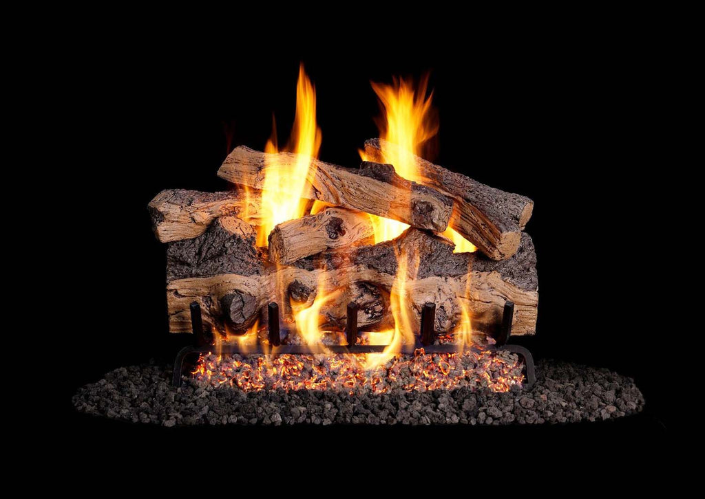 Vented gas log set with split oak logs and open flames in a firebox