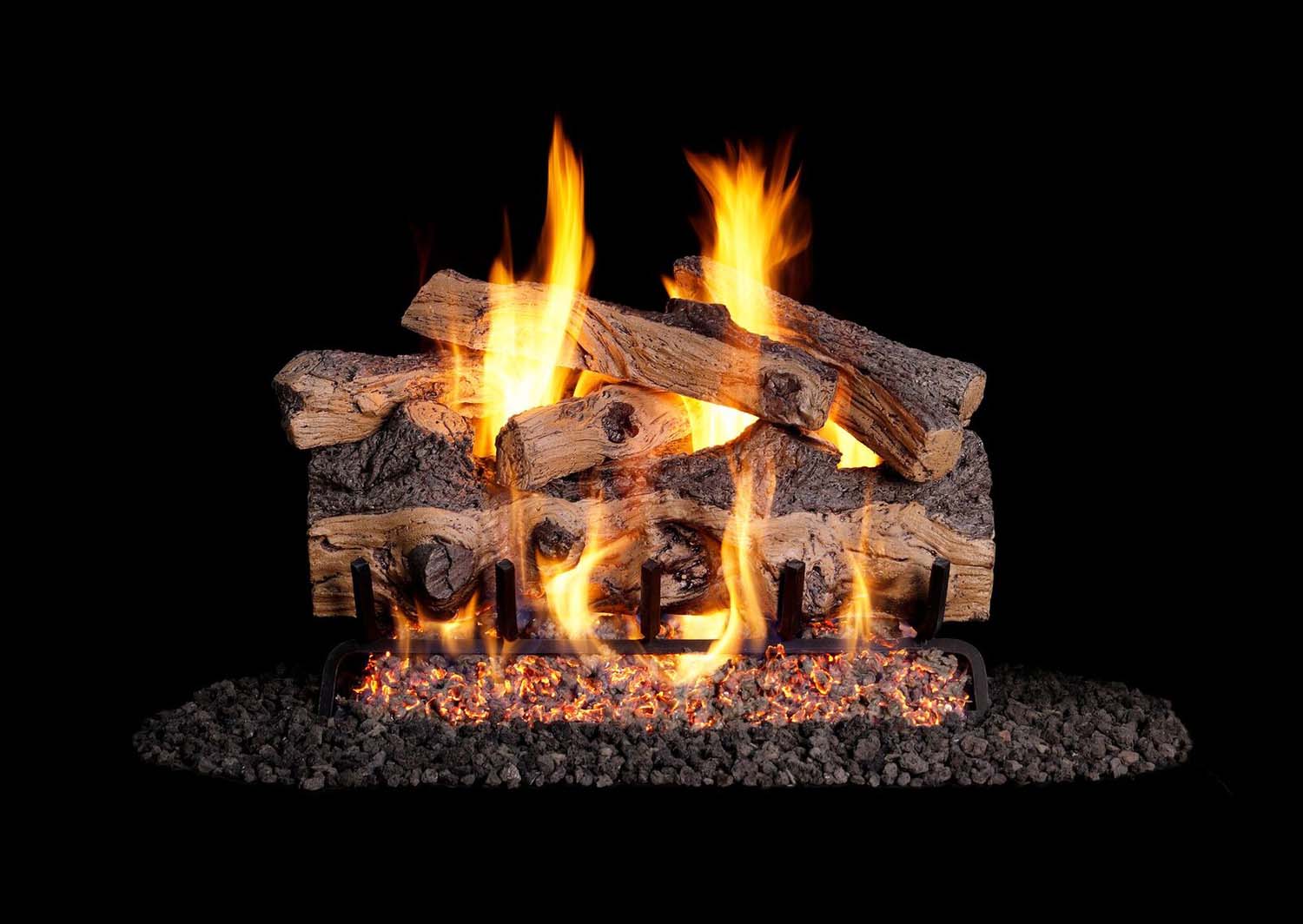Vented gas log set with split oak logs and open flames in a firebox