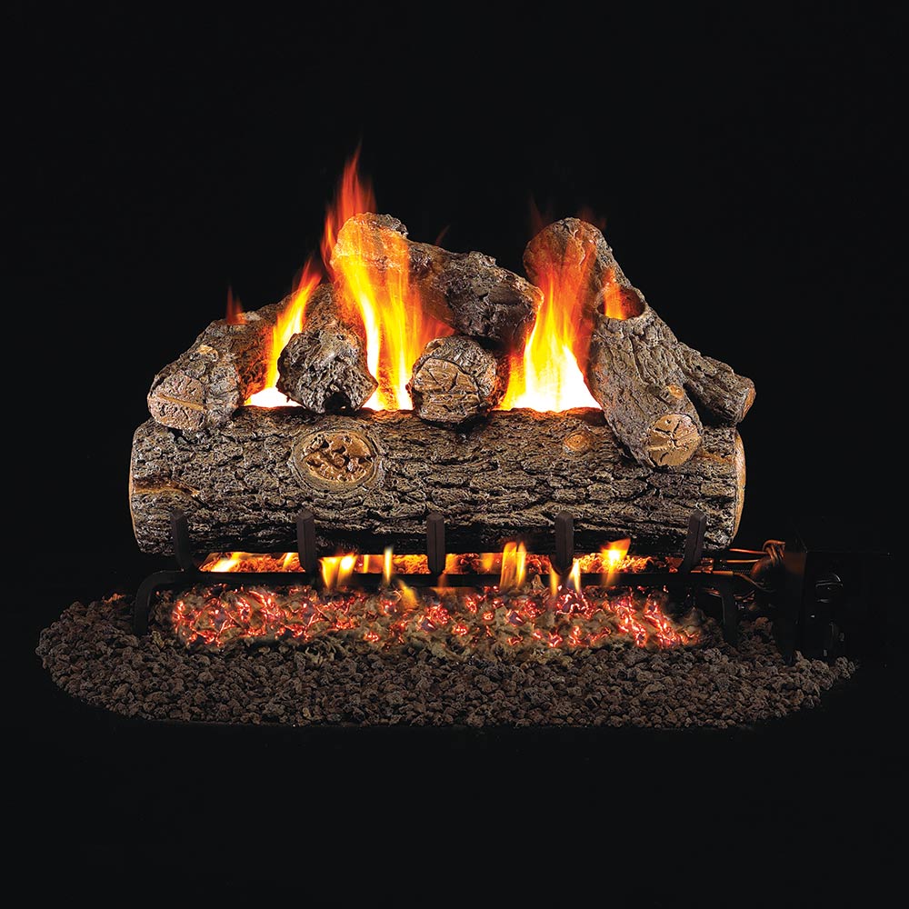Vented gas log set with glowing flames over split-stone logs