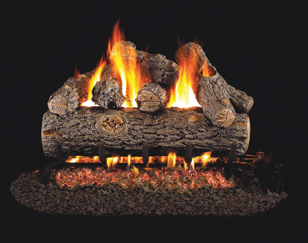 Vented gas log set with golden oak logs and glowing flames