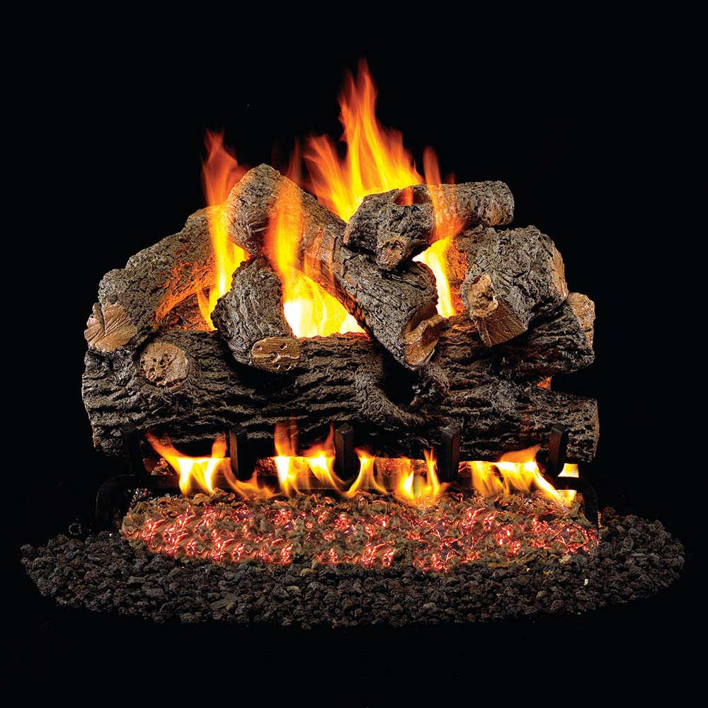 Vented gas logs with burning flames and glowing embers over dark log pieces
