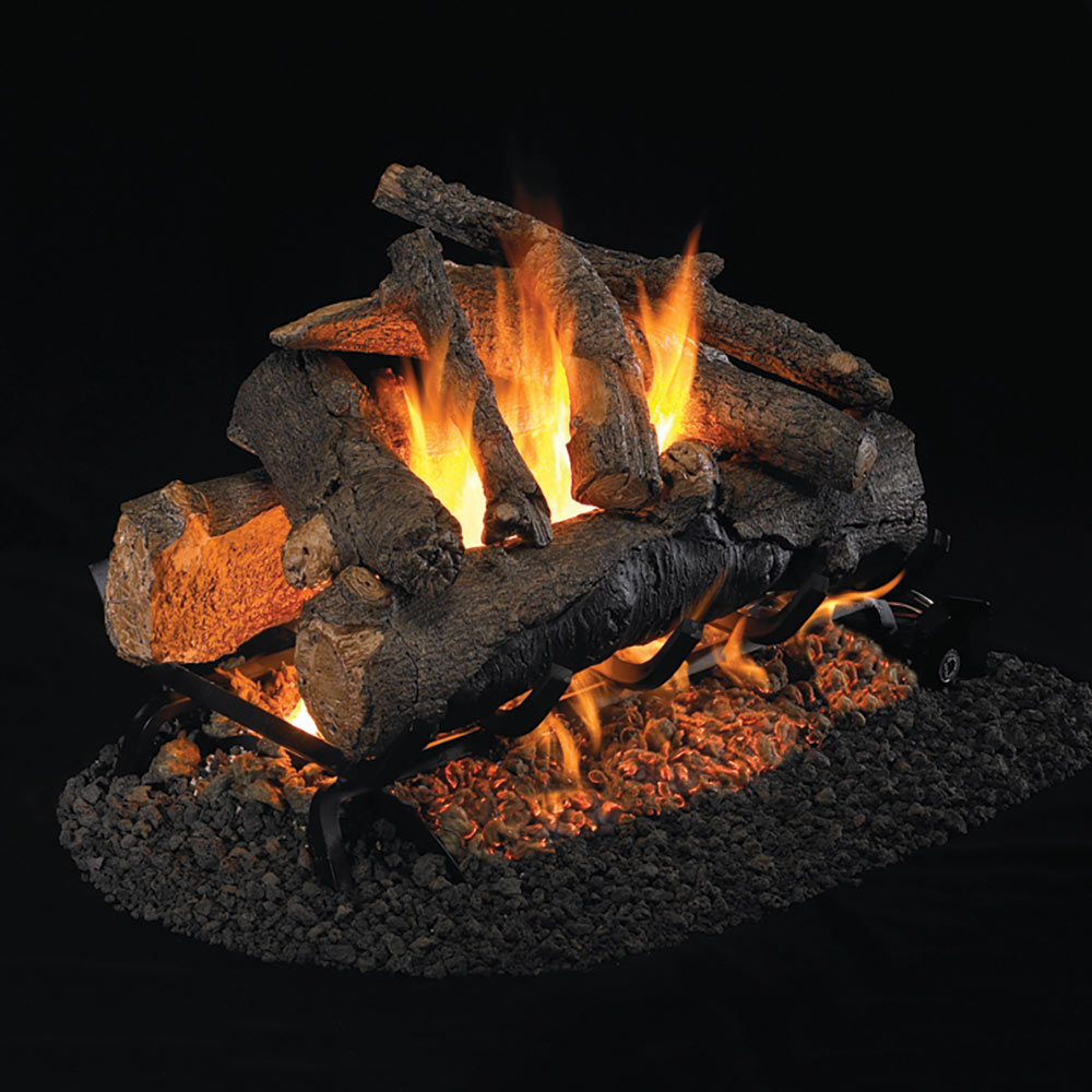 Vented gas fire log set with split wood pieces burning orange flames