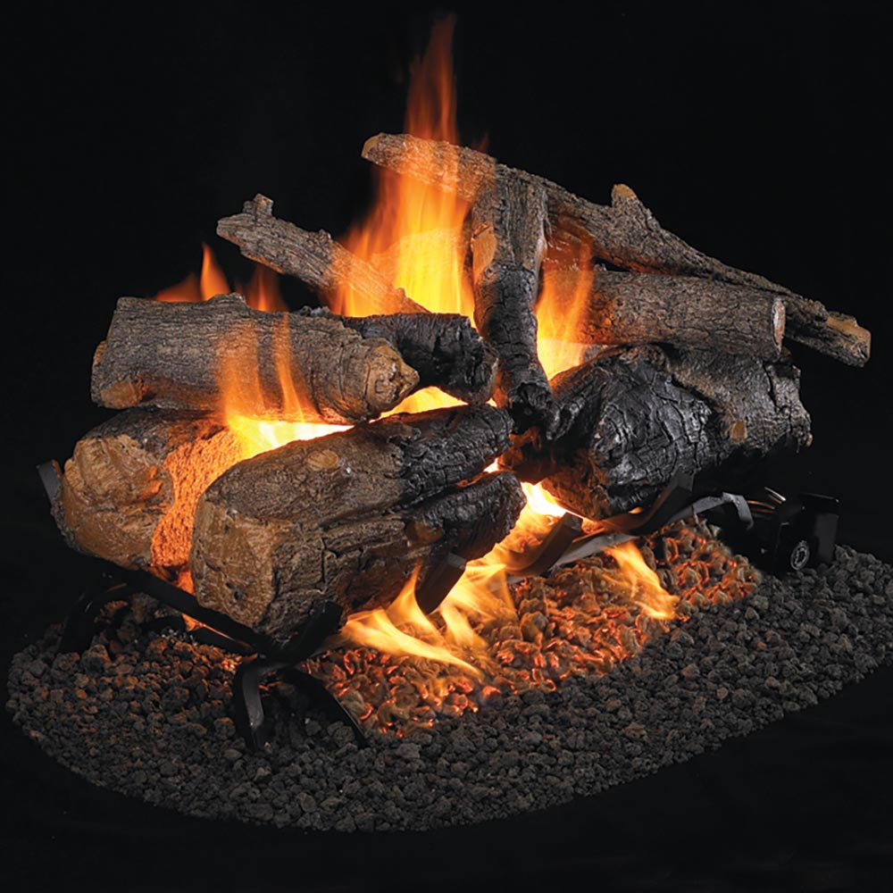 Charred oak gas log set with glowing flames and vented burner logs