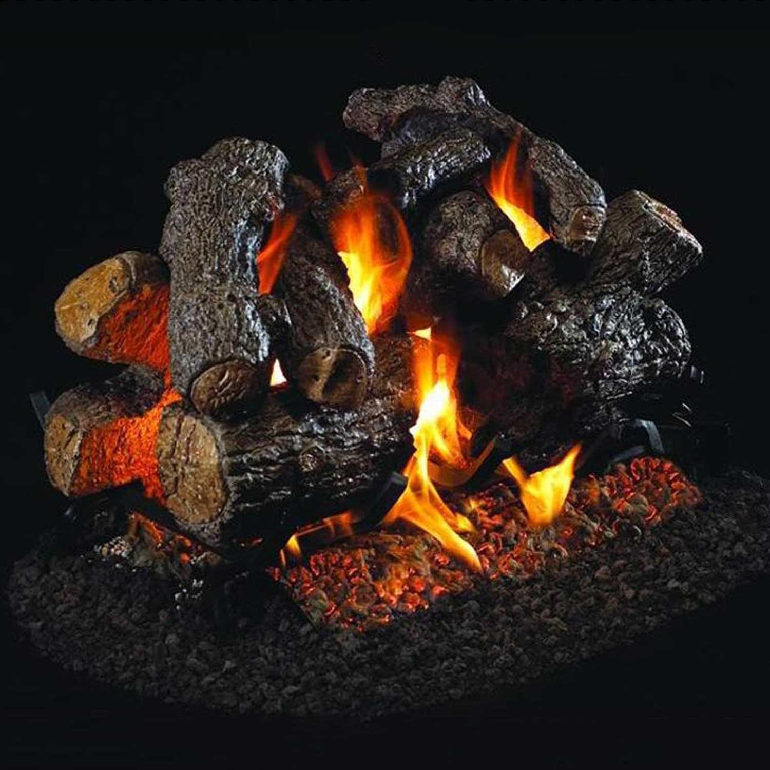 Charred gas fire logs with visible flames and embers, set of vented logs